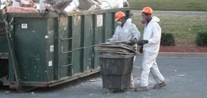 Mold Infested Walling Being Removed From Business Space